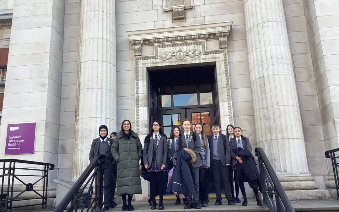 Students from Laurus Cheadle Hulme stand outside of the Samuel Alexander building at the University of Manchester Viva languages day 2024.