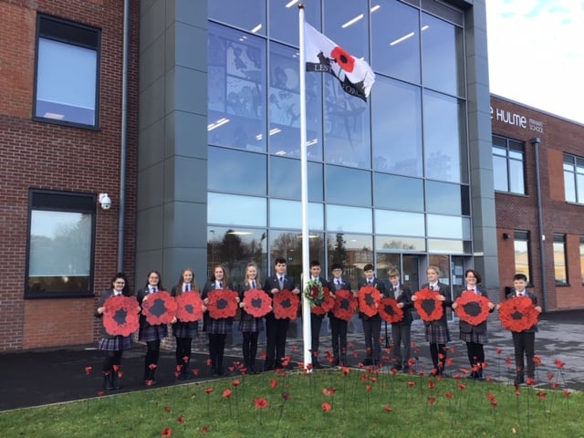 Students mark Remembrance Day with moving poppy display